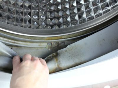 wasmachine rubberen rand schoonmaken